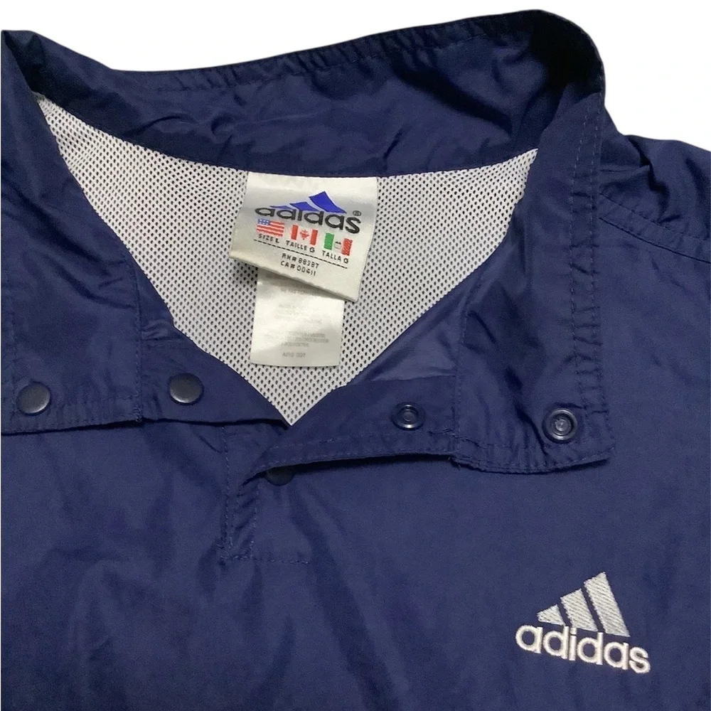 Vintage Adidas Men's Navy Windbreaker with White Stripes